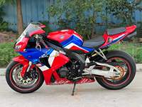 Moto de course sur circuit d'occasion Honda CBR1000RR 1000cc, quatre cylindres, sportive, rouge Repsol