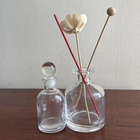 Bouteille en verre de diffuseur de roseau de vase décoratif de parfum à la maison unique vide avec des bâtons de chapeau