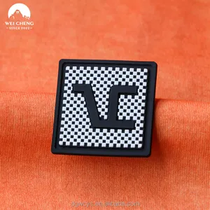Soft Rubber PVC Labels Supplier Custom Embossed Blue Logo Garment Silicone Patches for Clothing Side Label