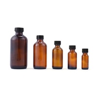 Vente en gros de bouteilles en verre rondes de type Boston de plusieurs tailles avec bouchons à vis noirs pour l'emballage d'huiles essentielles et d'extraits végétaux
