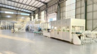 Línea de Producción Automática de Alta Velocidad para la Fabricación de Pañales para Adultos, Certificación CE, Amplia Compatibilidad con Materiales Primos