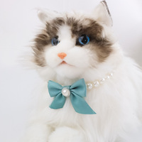 2023 vente en gros nouveau haute qualité classique perle mignon collier pour animaux de compagnie chien bijoux luxe chat collier GPS Tracker avec cloche arc