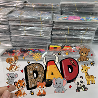 Autocollants en gros de qualité supérieure en PET plastisol, motifs dessin animé UV pour gobelets, wraps DTF pour tasses, autocollants lavables pour mugs, transferts