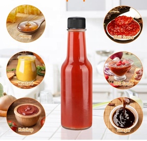 Machine de remplissage automatique de liquides et de pâtes <span class=keywords><strong>pour</strong></span> sauces chili - Haute efficacité 1600 bph, ligne de remplissage de bouteilles en acier inoxydable et plastique - Product Image 3