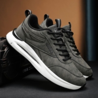 Chaussures de travail tendance pour hommes, imperméables et respirantes, en cuir et tissu, avec lacets, idéales pour la marche en automne