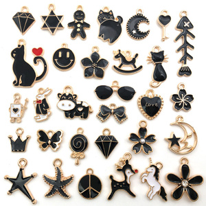 30 piezas de diseños mixtos, dijes de pendientes de <span class=keywords><strong>esmalte</strong></span> negro, rojo y azul para hacer joyas, dijes de aleación de Metal - Product Image 1