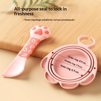 Ouvre-boîte pour aliments pour chats, couvercle anti-fuite en silicone, moderne et classique, 2-en-1, avec joint de sécurité en forme de patte de chat pour une conservation hermétique et une fraîcheur longue durée