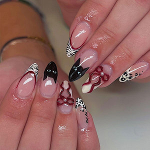Uñas postizas con forma de almendra y diseño de lazo, estilo francés 3D, con logo personalizable para arte de uñas, venta al por mayor Otoño/Invierno - Product Image 1