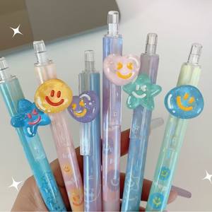 Mignon et Joyeux : Stylo mécanique 0,5 mm avec breloque en plastique pour visage, idéal pour l'école, les enfants et le bureau, avec décoration holographique étoile et cœur sur le stylo. - Product Image 4