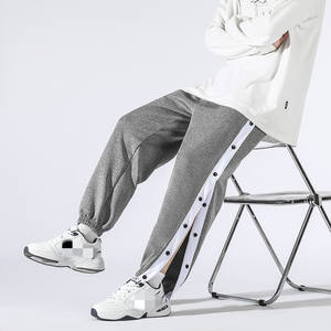 กางเกงแฟชั่นผู้ชายทรงหลวมมีกระดุมด้านข้างดีไซน์ล่าสุด - Product Image 4