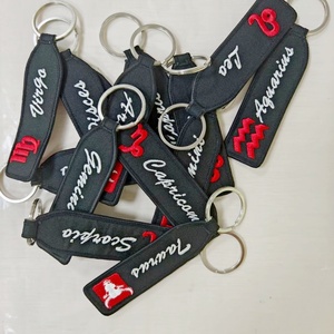 Regalo de tela Etiquetas de llavero bordadas Patrón de constelación Llaveros Logotipo personalizado Llaveros bordados - Product Image 6
