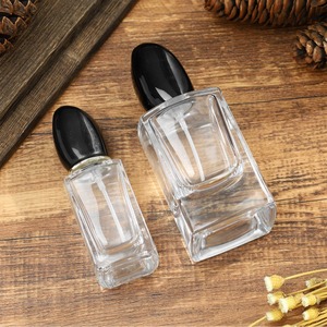 Botella de perfume de lujo con tapa negra, transparente, de vidrio, con atomizador a presión, de 30ml, 50ml, 100ml, para viajes y cuidado personal. - Product Image 3