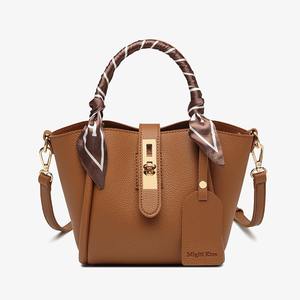 Litchi-grain leather women's <b>bag</b> with <b>gold</b> lock and designer tag - Product Image 4