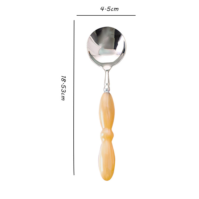 Cuchara redonda blanca Magnolia