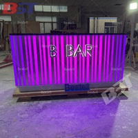 Comptoir en marbre noir de conception gentille Stockage en bois Maison Mini vin Comptoir de bar extérieur à LED