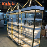 Vitrine à bijoux en verre avec cadre doré luxueux, éclairage LED, présentoir intelligent pour lunettes, adapté aux boutiques et centres commerciaux