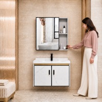 Meuble-lavabo mural Calacatta blanc en aluminium nid d'abeille avec finition dorée, miroir double porte, étagères latérales et cadre noir
