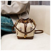 Sac à bandoulière grande capacité tendance et personnalisé en PU pour femme, nouveau sac seau à cordon mignon et texturé avec motif dessin animé