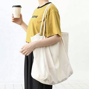 Sacs fourre-tout noirs tendance, sacs de shopping personnalisés avec logo, sacs à bandoulière en toile pour la vente en gros - Product Image 1