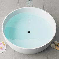 Baignoire ronde noire en résine et marbre, Surface unie en pierre artificielle