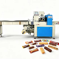 Horizontale Drei-Servo-Motoren-Kissenbeutel-Folienrollverpackungsmaschine für Schokoladenriegel und Süßigkeiten