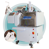 Machine à nouer entièrement automatique pour enfiler les étiquettes de vêtements Machine automatique à enfiler les étiquettes