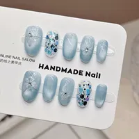 Faux ongles gothiques à presser faits à la main, couleur unie, motif papillon, courts, avec accents œil de chat