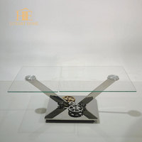 2025 vente chaude table basse élégante mécanique à engrenages en acier inoxydable avec table centrale en verre trempé transparent