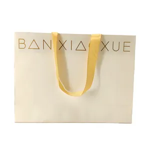 Saco de papel para presente de compras de luxo comercial com logotipo dourado personalizado e exclusivo colorido