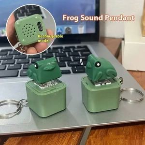 Llavero de rana de dibujos animados con sonido y luz LED, juguete sensorial antiestrés - Product Image 1