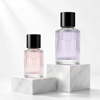 Venta al por Mayor, Stock Disponible, Marca HUAFAN, Botellas de Perfume de Vidrio Transparente Cilíndricas de 30ml/50ml/100ml, Tapas Negras, Pulverizador con Bomba