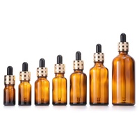 Flacon compte-gouttes en verre brun de 5 ml, 10 ml, 15 ml, 20 ml, 30 ml, 50 ml, 100 ml, flacon d'huile essentielle ambrée avec bouchon compte-gouttes doré
