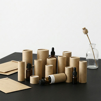 Caja cilíndrica de cartón kraft para aceites esenciales, perfume, caja redonda de cartón grueso, proveedor mayorista personalizado, Súper Septiembre