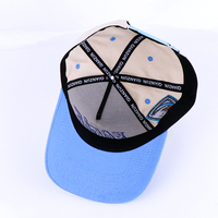 Qianzun fabricación china hombres logotipo personalizado OEM bordado 5 paneles SnapBack borde curvo gorra de béisbol de dos tonos