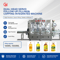 Machine de remplissage et de bouchage industrielle à double tête servo, haute précision, pour bouteilles de liquide, pour usage en usine