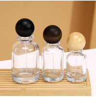 Flacons de parfum cylindriques de luxe en verre 100 ml avec couvercles en bois, vides, transparents ou ambrés, pour diffuseur de parfum d'ambiance à bâtonnets avec pompe pulvérisatrice