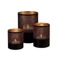 Ensemble de porte-bougies cylindriques en métal noir et or, faits à la main, avec un design perforé, résistants à la chaleur, décoration pour la maison
