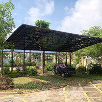 Abri de voiture moderne et stable en alliage d'aluminium pour deux véhicules, avec toit en polycarbonate, solution de stationnement extérieur étanche