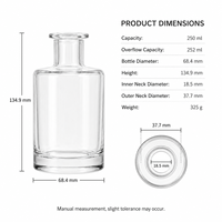 Flacon cylindrique élégant en verre transparent de 250 ml avec logo personnalisé et impression sérigraphique pour le stockage d'huiles essentielles et de parfums