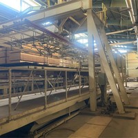 Ligne de production de laminage professionnelle d'occasion, machine de laminage de placage mélaminé d'occasion pour le revêtement des panneaux MDF et PB