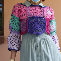 Haut en tricot moderne et léger pour femme, avec manches ballon ajourées au crochet, style pull ou chemisier