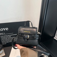 2026 Neue Trendige Bonbonfarbene Mädchen-Minihandtasche aus PU-Leder Modische Damen-Geldbörse Tragbare Frauen-Mini-Umhängetasche