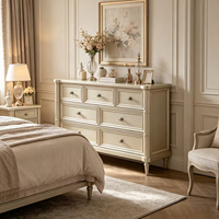 Commode de luxe à 7 tiroirs avec finition dorée, commode classique en bois pour le rangement de la chambre à coucher