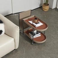 Table d'appoint mobile en cuir avec rangement, style luxe léger, pour salon, en acier inoxydable, petite table basse