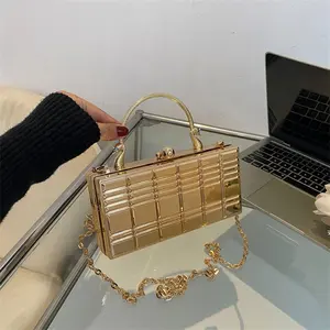 2023 Fashion Acrylic Bueno Designer Bag Lady Gold Chain Shoulder PVC Cosmetic Bag Metal Handle Golden Handbag for Women