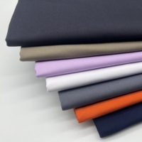 Vente en gros de textiles en stock, tissus unis peignés en toile 100% coton pour vêtements de travail, vêtements uniformes et costumes