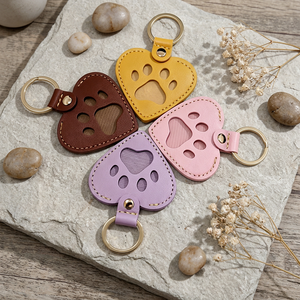Vente en gros <span class=keywords><strong>de</strong></span> porte-clés en cuir en forme <span class=keywords><strong>de</strong></span> patte <span class=keywords><strong>de</strong></span> chien pour les amoureux des animaux - Product Image 1