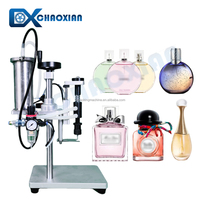 Mini prix bon marché machine de remplissage de remplissage de parfum liquide sous vide machine d'embouteillage de vin en verre à entraînement pneumatique