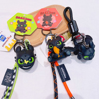 Porte-clés pendentif figurine mignonne de petit dragon volant sans dents en noir et blanc de dessin animé, écologique, pour la rentrée scolaire, vente en gros