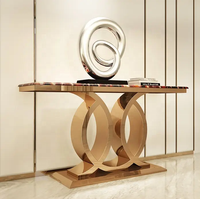 Table basse moderne de luxe avec base en acier inoxydable doré et dessus en marbre, table d'entrée étroite